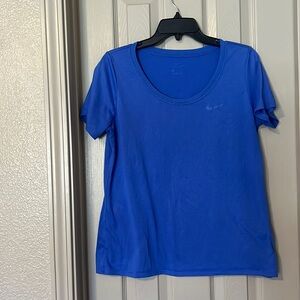Nike women’s blue top